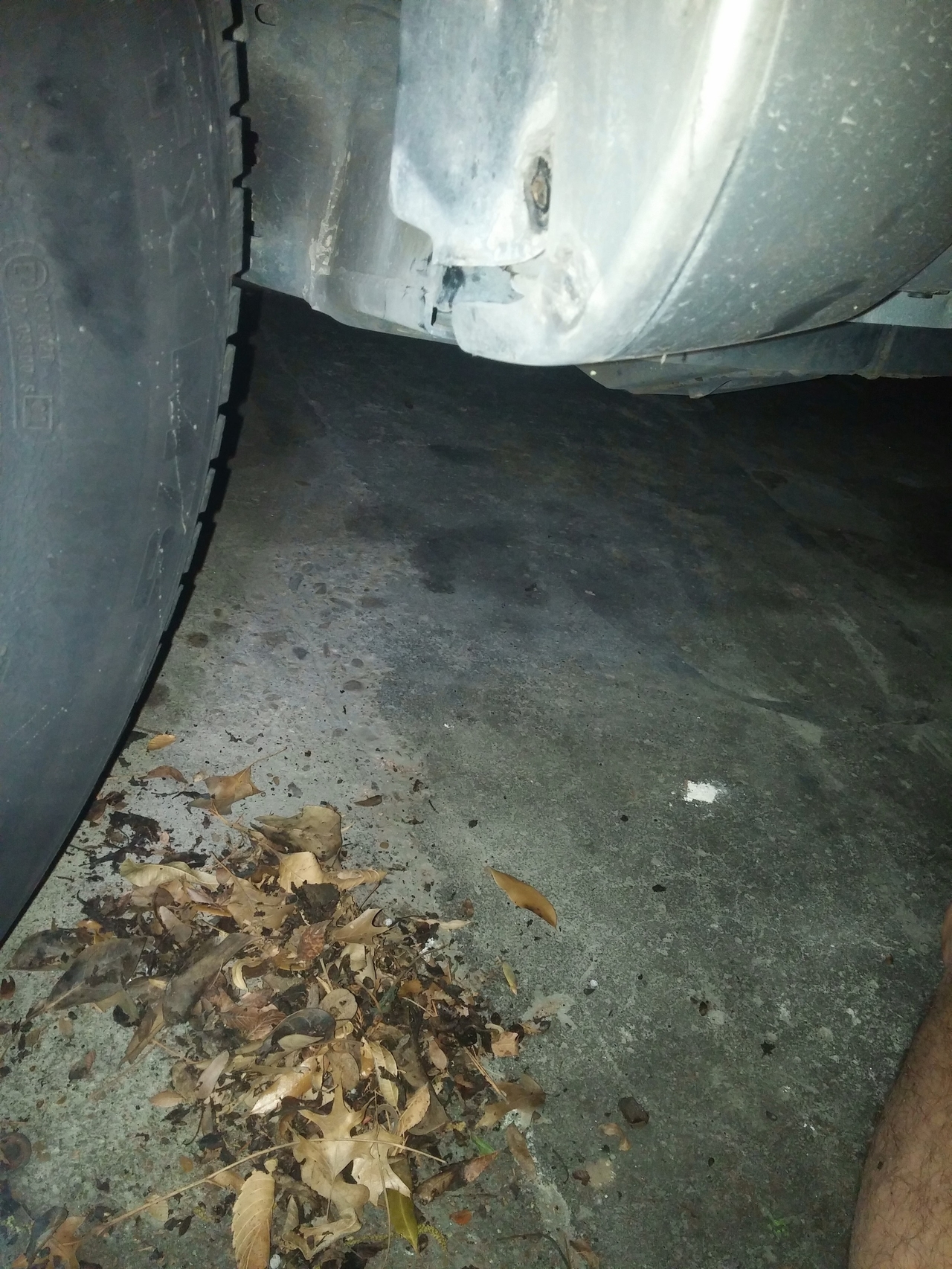 Removing debris from behind fender